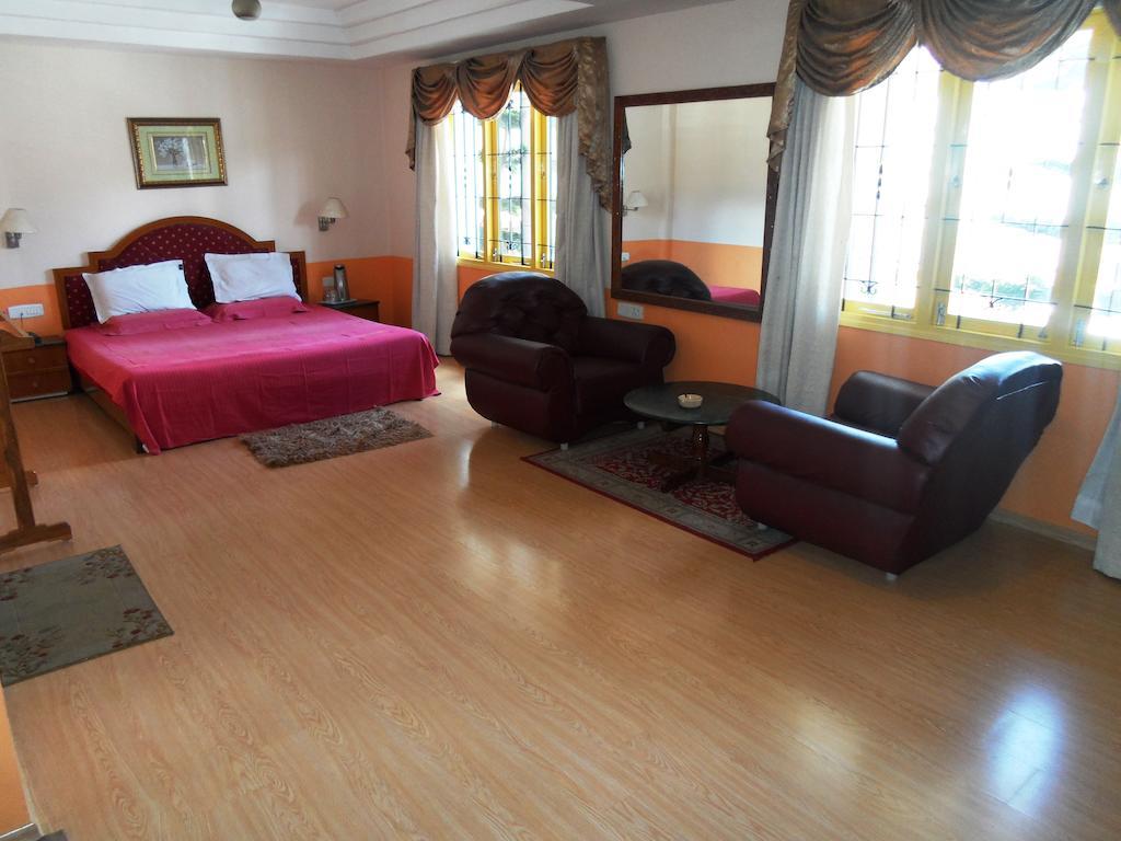 Hotel Grand Palace Kodaikanal Rom bilde